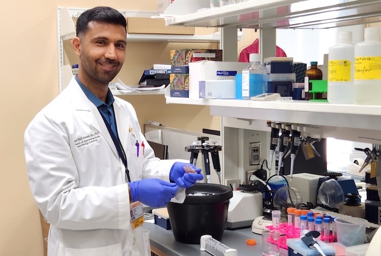 Dr Aseem in a lab